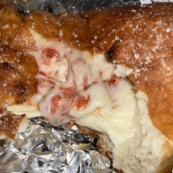 Pizza Marsala - Inside cheese calzone - Italian Near Me - Monroeville, Pennsylvania Pizza Marsala - Inside cheese calzone - Italian Near Me - Monroeville, Pennsylvania