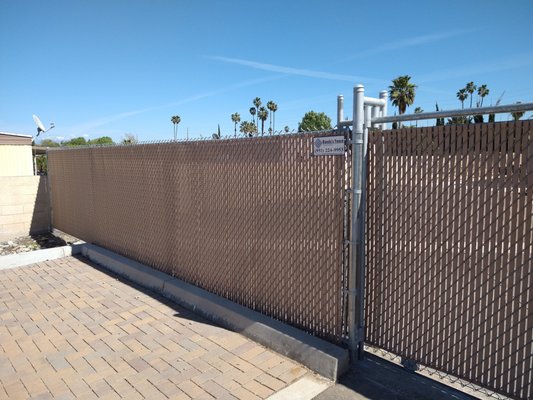 Commercial Privacy chain-link  fence - Chain link fences, provided by Banda’s Fence, are a practical and cost-effective solution for securing properties, offering durability and visibility while keeping pets safe and deterring intruders.