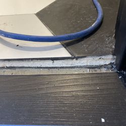 In And Out Flooring - Area where threshold should be