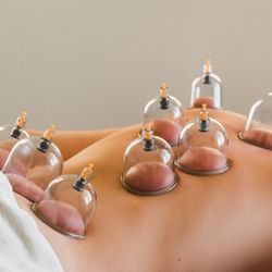 Feeling Great Therapeutic & Lymphatic Massage - Cupping used to release muscle tension
