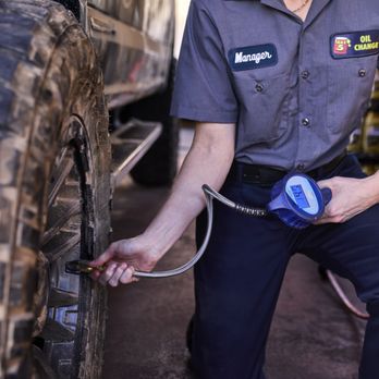 Take 5 Oil Change - Filling a tire with air during an oil change. - Oil Change Stations Near Me - Round Rock, Texas Take 5 Oil Change - Filling a tire with air during an oil change. - Oil Change Stations Near Me - Round Rock, Texas