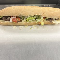 International Sandwich Shop - No one has this fresh Steak n Cheese 16" sub on homemade bread except ISS 1 and 2