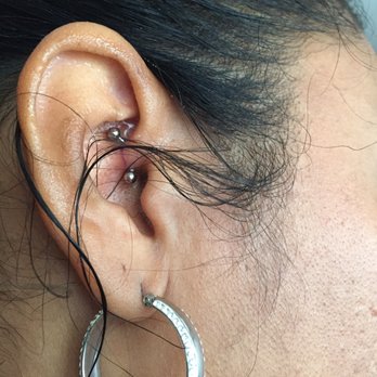 Ocean Mystique Ink Gallery - Daith Piercing - OUCH!! - Tattoo Near Me - Virginia Beach, Virginia Ocean Mystique Ink Gallery - Daith Piercing - OUCH!! - Tattoo Near Me - Virginia Beach, Virginia