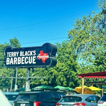 Terry Black's Barbecue - Outside in the parking lot - Barbeque Near Me - Austin, Texas Terry Black's Barbecue - Outside in the parking lot - Barbeque Near Me - Austin, Texas