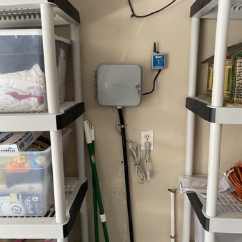 Mac Irrigation Services - a water meter in a room - Landscaping Near Me Mac Irrigation Services - a water meter in a room - Landscaping Near Me