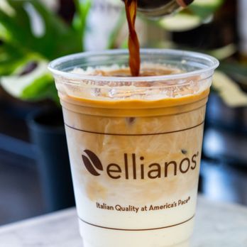 Ellianos Coffee - a person pouring coffee into a cup - Coffee & Tea Near Me - Gainesville, Florida Ellianos Coffee - a person pouring coffee into a cup - Coffee & Tea Near Me - Gainesville, Florida