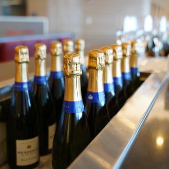 American Airlines Flagship First Lounge - Champagne is overflowing. - Airport Lounges Near Me - Jamaica, New York American Airlines Flagship First Lounge - Champagne is overflowing. - Airport Lounges Near Me - Jamaica, New York