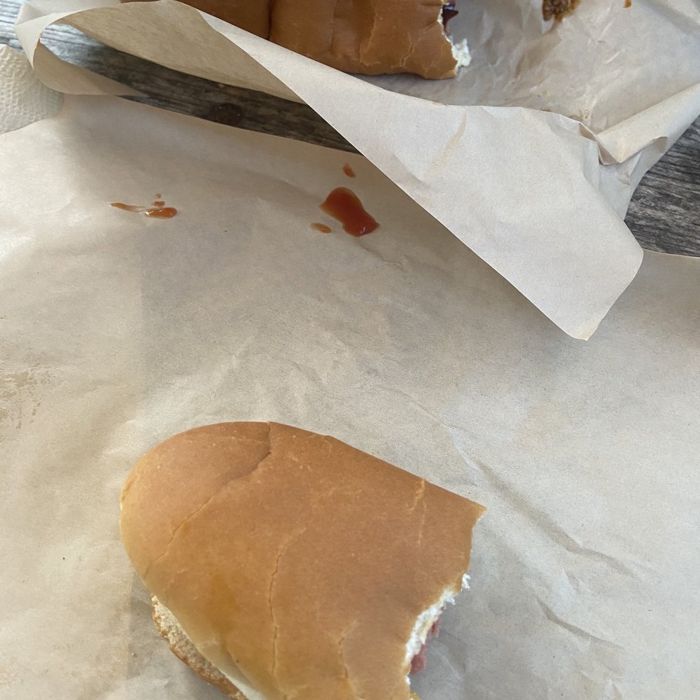 Two old fashion hot dogs (top chili, bottom ketchup/mustard/onions) Two old fashion hot dogs (top chili, bottom ketchup/mustard/onions)