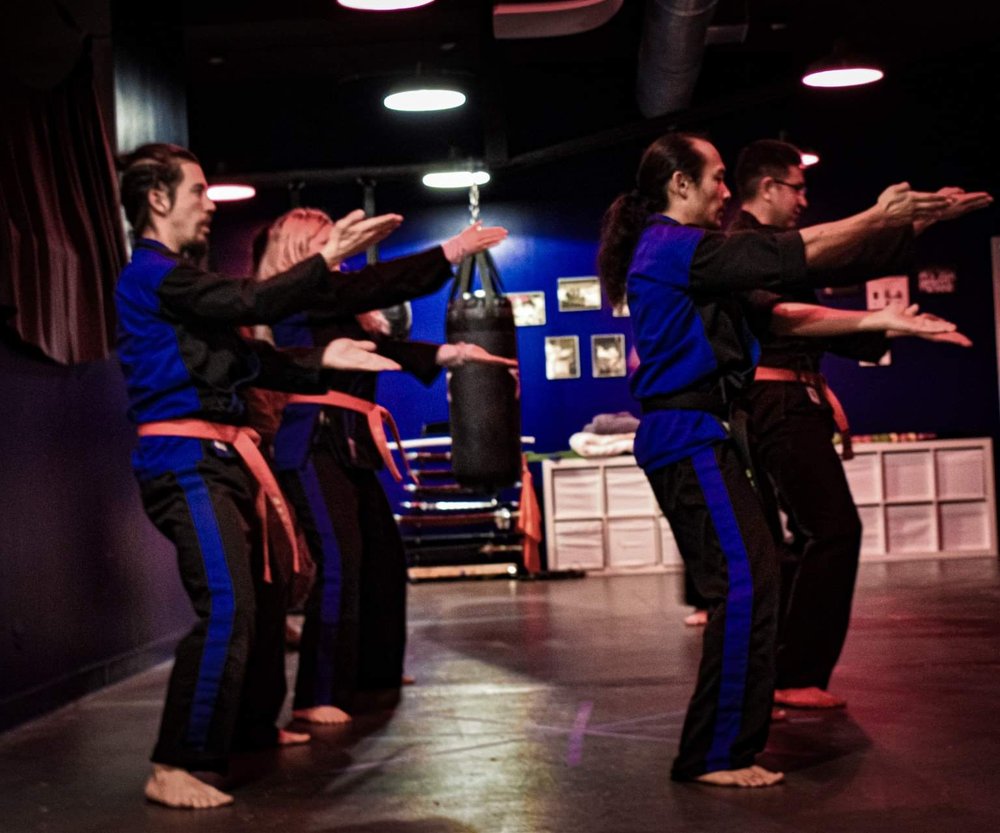 8 Hands Martial Arts Logo