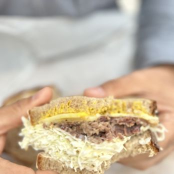 Sammich - a person holding a sandwich in their hands - Delis Near Me - Portland, Oregon Sammich - a person holding a sandwich in their hands - Delis Near Me - Portland, Oregon