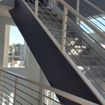 USA Home Improvements - New home - open stairwell with accents - Painters Near Me