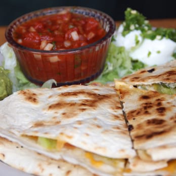 Mountain Sun Pub & Brewery - Grilled tortillas, Monterey Jack and cheddar, onions, spinach, green peppers, diced jalapenos, and tomatoes. - Pubs Near Me - Boulder, Colorado Mountain Sun Pub & Brewery - Grilled tortillas, Monterey Jack and cheddar, onions, spinach, green peppers, diced jalapenos, and tomatoes. - Pubs Near Me - Boulder, Colorado