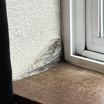 Sitka Hotel - windowsill needs repair and mold removal - Hotels Near Me - Sitka, Alaska