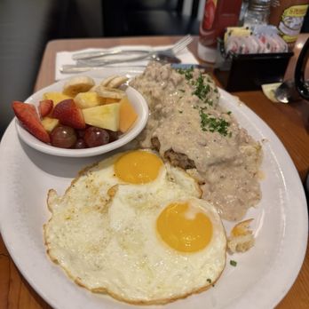 From Scratch Restaurant - biscuits and gravy dish (Sausage Patties are underneath the sauce) - Breakfast & Brunch Near Me - Carmel, California From Scratch Restaurant - biscuits and gravy dish (Sausage Patties are underneath the sauce) - Breakfast & Brunch Near Me - Carmel, California