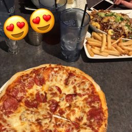 a pizza and fries a pizza and fries