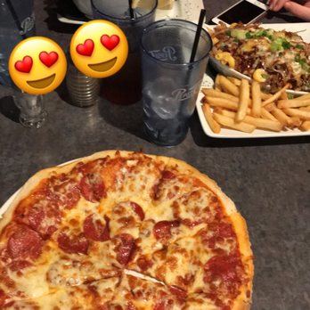 Twigg's Bar & Grill - a pizza and fries - Sports Bars Near Me - Lakeshore, Ontario Twigg's Bar & Grill - a pizza and fries - Sports Bars Near Me - Lakeshore, Ontario