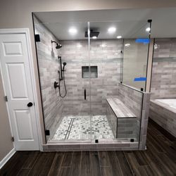 Monarch Bay Renovations - Shower with rain head and wand - we changed the floor plan and had them make us a big shower.  We love it!