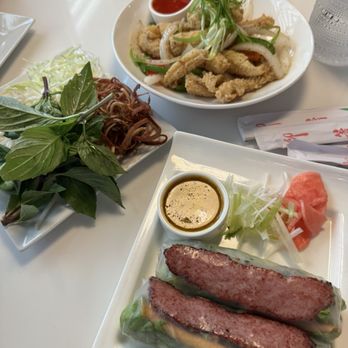 Saigon Bistro Chantilly - Summer Pork Sausage Spring Rolls (nem nuong cuon) and Salt and Pepper Calamari (muc rang muoi) - Vietnamese Near Me - Chantilly, Virginia Saigon Bistro Chantilly - Summer Pork Sausage Spring Rolls (nem nuong cuon) and Salt and Pepper Calamari (muc rang muoi) - Vietnamese Near Me - Chantilly, Virginia