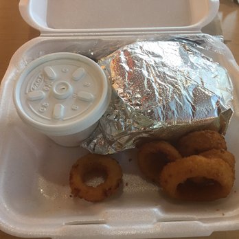 Cook Out - a sandwich and onion rings in a styrofoam container - Burgers Near Me - Warner Robins, Georgia Cook Out - a sandwich and onion rings in a styrofoam container - Burgers Near Me - Warner Robins, Georgia