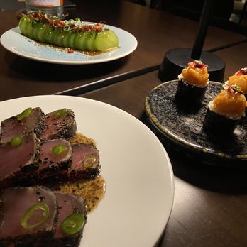 Nami - Clockwise: Cucumber Salad, Spicy Hamachi Nami, Tuna Crudo - Japanese Near Me - Orlando, Florida Nami - Clockwise: Cucumber Salad, Spicy Hamachi Nami, Tuna Crudo - Japanese Near Me - Orlando, Florida