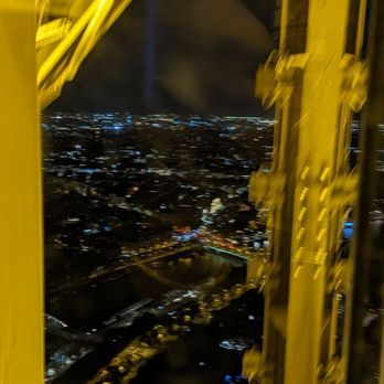 La Tour Eiffel - A photo while taken while on the ride down from the summit. - Landmarks & Historical Buildings Near Me - Paris, 75 La Tour Eiffel - A photo while taken while on the ride down from the summit. - Landmarks & Historical Buildings Near Me - Paris, 75