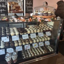 Miss Priss Cupcakes & Such - Coffee cake pieces in the center on the display case