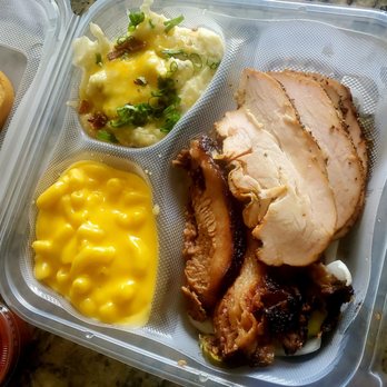 The Brisket House - Turkey brisket mac and cheese and loaded potato - Barbeque Near Me - Houston, Texas