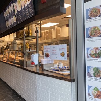 Sesame - a restaurant with a menu on the wall - Chinese Near Me - Vancouver, British Columbia