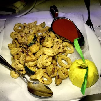 Osteria Vecchio Piemonte - Fritto di Calamari - w/ bits of fried zucchini - served w/ marinara sauce and fresh lemon - Italian Near Me - Miami, Florida Osteria Vecchio Piemonte - Fritto di Calamari - w/ bits of fried zucchini - served w/ marinara sauce and fresh lemon - Italian Near Me - Miami, Florida
