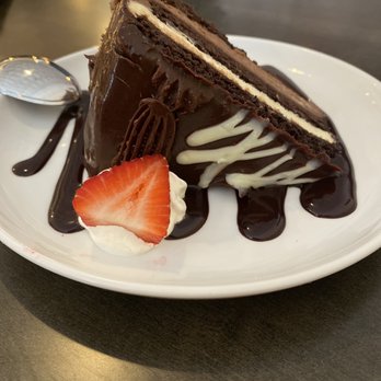 The Standard on Vaughan - Chocolate cake with various layers of chocolate. A nice finish to any meal & not to heavy! - Cocktail Bars Near Me - Bertram, Texas The Standard on Vaughan - Chocolate cake with various layers of chocolate. A nice finish to any meal & not to heavy! - Cocktail Bars Near Me - Bertram, Texas