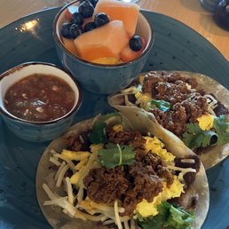 Breakfast tacos with vegan chorizo. Sub fruit for potatoes