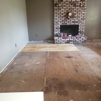 J.V's Floorcoverings - The living room "before" - Carpet Installation Near Me