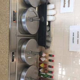a row of pots and pans a row of pots and pans