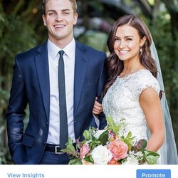 Great couple with amazing suit for a wedding.