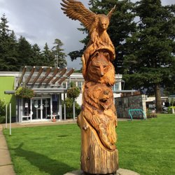 District Hall - Site view (end of Sept/19) - office building at back, great wood sculpture on the lawn out front.