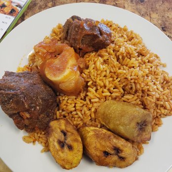 Jollof Pot - Jollof rice, plantains, assorted meats - African Near Me - Miramar, Florida Jollof Pot - Jollof rice, plantains, assorted meats - African Near Me - Miramar, Florida