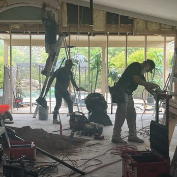 Crafted Remodeling - a group of men working in a house - Flooring Near Me - Glendale, Arizona
