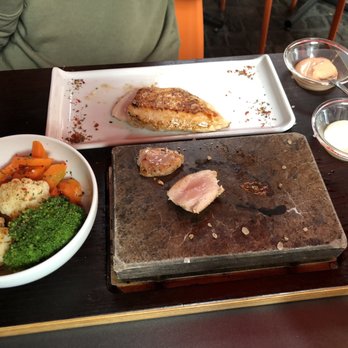 Restaurant N-68 - Chicken. You cook it to finish on the hot stone. - American Near Me - Zürich, ZH Restaurant N-68 - Chicken. You cook it to finish on the hot stone. - American Near Me - Zürich, ZH