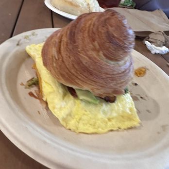 Teal House Coffee And Bakery - Breakfast sandwich on croissant with bacon & avo. - Bakeries Near Me - Austin, Texas