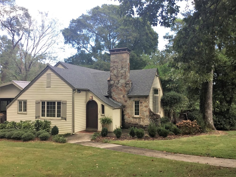 Slide of Team Roofing and Construction