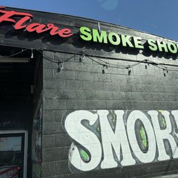 Exterior outside entrance of Flare Smoke Shop - Building sign - Patterson, California Exterior outside entrance of Flare Smoke Shop - Building sign - Patterson, California