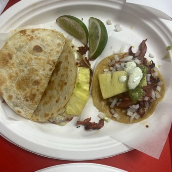 Tacos El Porky - A Gringa taco cut in half with some pineapple. Also a Taco al Pastor - Tacos Near Me - Miami, Florida Tacos El Porky - A Gringa taco cut in half with some pineapple. Also a Taco al Pastor - Tacos Near Me - Miami, Florida