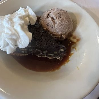 Purple Poulet - Bourbon pecan chocolate pie with cherry chocolate almond Ice cream - Southern Near Me - Newport, Kentucky Purple Poulet - Bourbon pecan chocolate pie with cherry chocolate almond Ice cream - Southern Near Me - Newport, Kentucky
