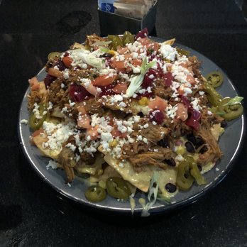 Loft18 - Loaded Nachos with pulled pork $11.50 - Sports Bars Near Me - Metairie, Louisiana Loft18 - Loaded Nachos with pulled pork $11.50 - Sports Bars Near Me - Metairie, Louisiana