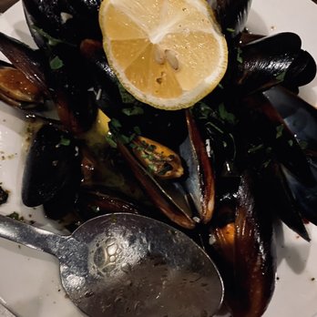Saviano's Italian Kitchen - Mussels steamed in a lemon butter wine sauce with roasted garlic (save some of the broth to dip your bread into) - Italian Near Me - Euless, Texas Saviano's Italian Kitchen - Mussels steamed in a lemon butter wine sauce with roasted garlic (save some of the broth to dip your bread into) - Italian Near Me - Euless, Texas