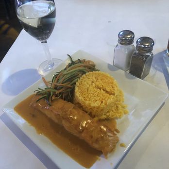 Trotters Bar and Grill - Pan-Seared Salmon with Lobster Broth - Sports Bars Near Me - Franklin Square, New York Trotters Bar and Grill - Pan-Seared Salmon with Lobster Broth - Sports Bars Near Me - Franklin Square, New York
