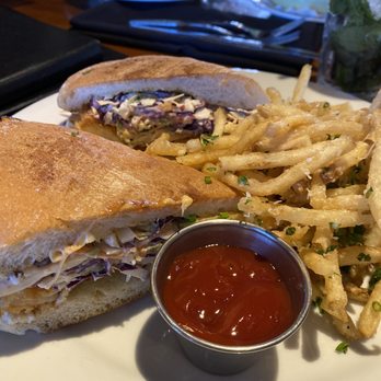 Cover 3 - Shrimp Po' Boy Sandwich with Parmesan fries - New American Near Me - Austin, Texas Cover 3 - Shrimp Po' Boy Sandwich with Parmesan fries - New American Near Me - Austin, Texas