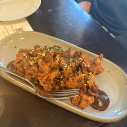 Crispy Harissa Cauliflower: savory fig jam, chive, pistachio dukkah
