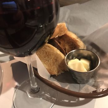 Lassen Steakhouse - Bread basket with wine from a local winery - Steakhouses Near Me - Vina, California