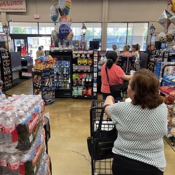 Smart & Final - Jackknifed line at the single register that wraps to the left as well as down the aisle. - Grocery Near Me - Torrance, California